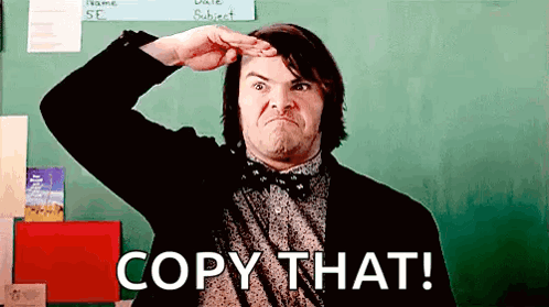 Man in Suit and Bow Tie Saying Copy That