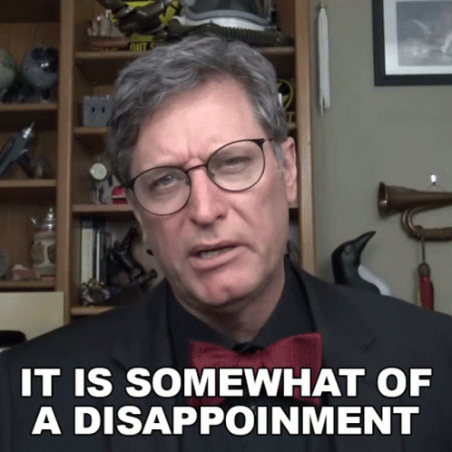 Man In Suit And Bow Tie Says It Is Somewhat Of A Disappointment GIF