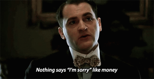 Man in Suit and Bow Tie Says Nothing Says I'm Sorry Like Money