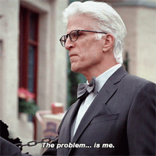 Man in Suit and Bow Tie Says The Problem ... Is Me