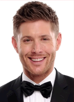 Man in Suit and Bow Tie Smiling