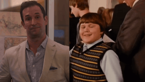 Man In Suit And Boy In Striped Vest GIF