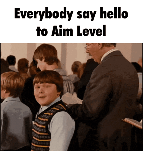 Man in Suit and Boy in Striped Vest Say Hello