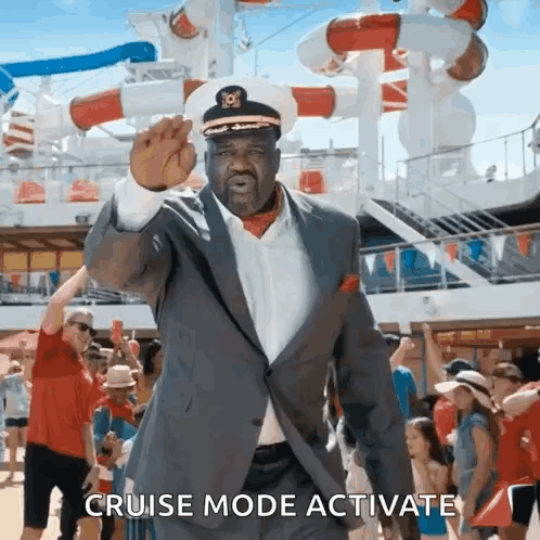 Man in Suit and Captain Hat Dancing on Cruise Ship