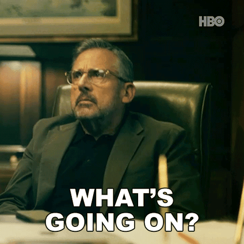 Man in Suit and Glasses Asking What's Going On