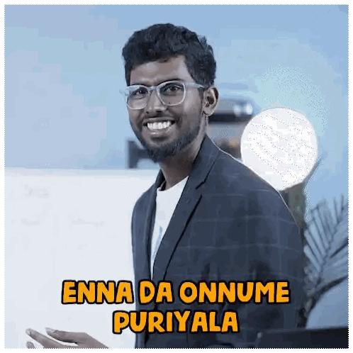Man in Suit and Glasses Enna Da Onnume Puriyala