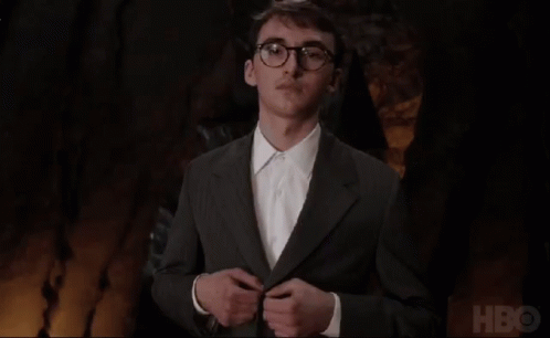 Man in Suit and Glasses in Front of HBO