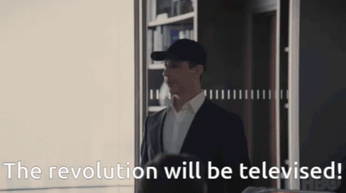 Man In Suit And Hat Saying The Revolution Will Be Televised GIF