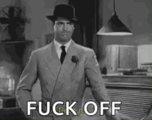 Man In Suit And Hat Standing GIF