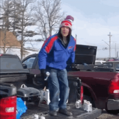 Man In Suit And Hat Standing In Front Of Stadium With Arms Crossed Says Papa B34r GIF