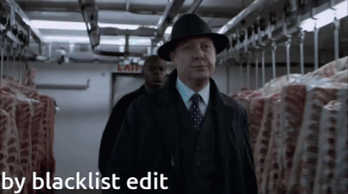 Man In Suit And Hat Walking Through Meat Locker By Blacklist Edit GIF