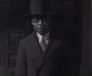 Man in Suit and Hat