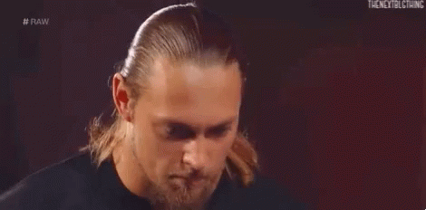 Man In Suit And Headphones Shaking Hands In Ring GIF