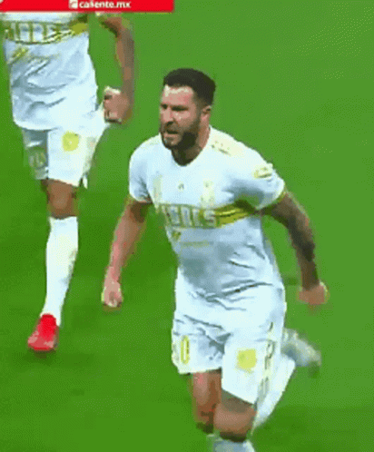 Man in Suit and Man in White Jersey 11