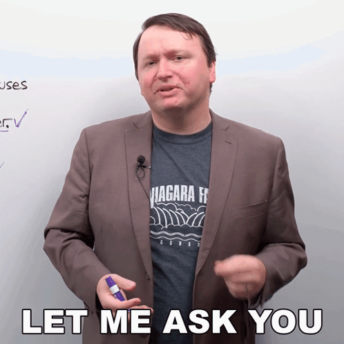 Man in Suit and Niagara T-Shirt Says Let Me Ask You