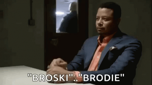 Man In Suit And Orange Shirt Saying Broski Brodie GIF