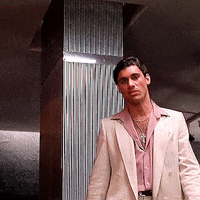 Man in Suit and Pink Shirt