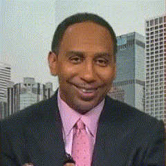 Man in Suit and Pink Tie Smiling