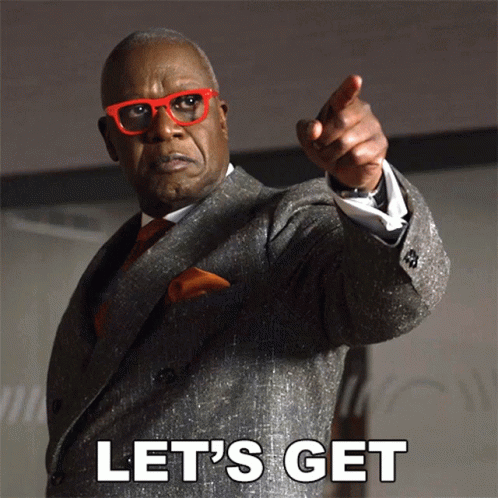 Man in Suit and Red Glasses Let's Get Pointing