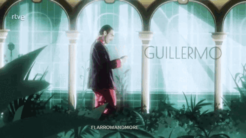 Man In Suit And Red Pants Before Guillermo Sign GIF