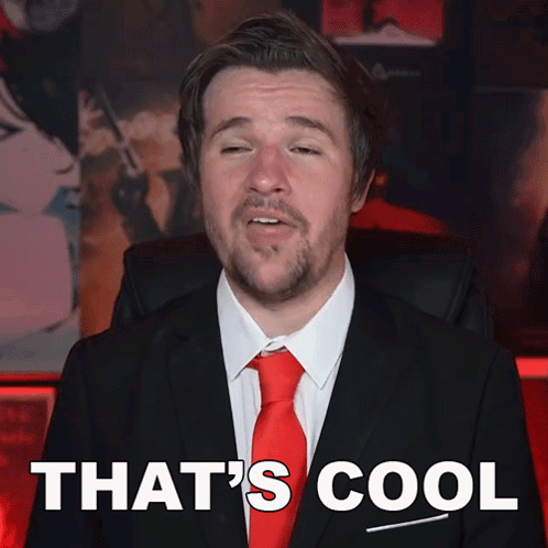 Man in Suit and Red Tie Saying That's Cool