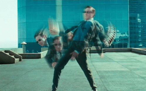 Man in Suit and Sunglasses Dancing on Rooftop
