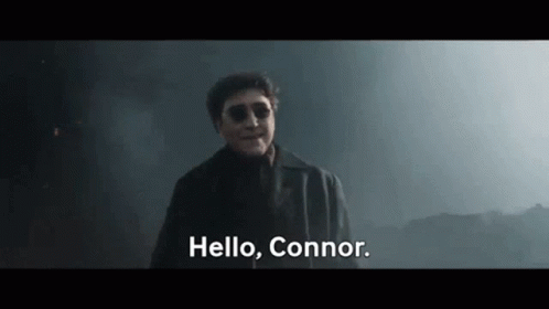 Man in Suit and Sunglasses Saying Hello Connor