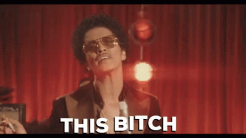 Man in Suit and Sunglasses Saying This Bitch
