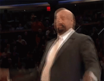 Man in Suit and Tie Arms Out