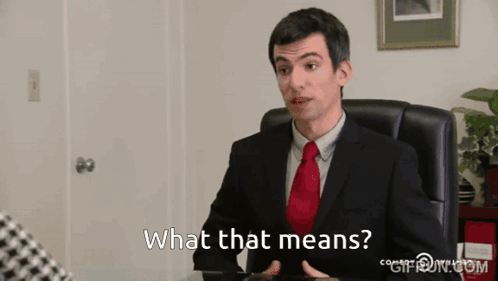 Man in Suit and Tie Asking What That Means
