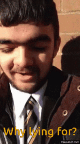 Man in Suit and Tie Asking Why He Is Lying For