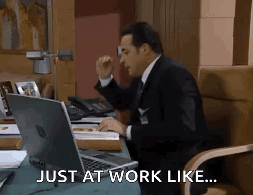 Man in Suit and Tie at Desk