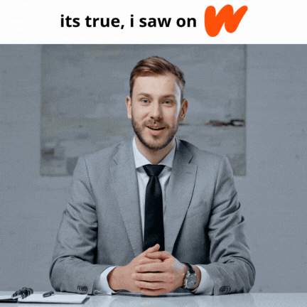 Man in Suit and Tie at Desk