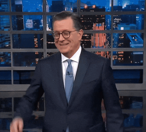 Man in Suit and Tie at Fox News Window