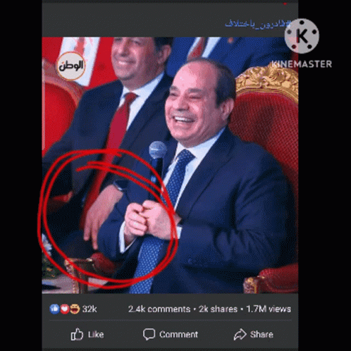 Man in Suit and Tie at Microphone Hand Circled Red