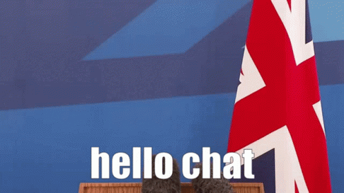 Man in Suit and Tie at Podium Hello Chat