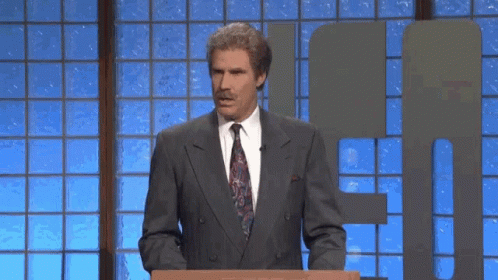 Man in Suit and Tie at Podium Saying Way Too Early