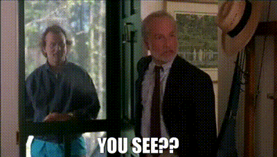 Man In Suit And Tie At Window Saying You See GIF
