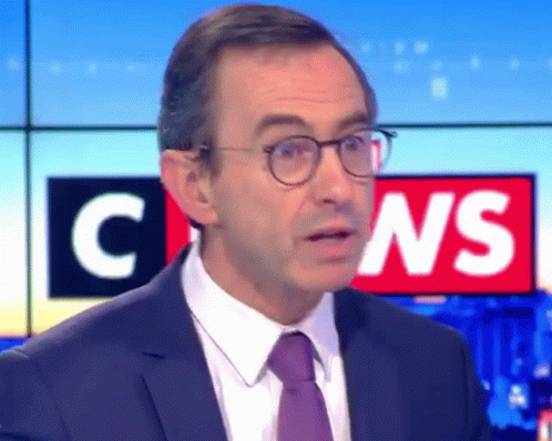 Man In Suit And Tie Before C News Sign GIF
