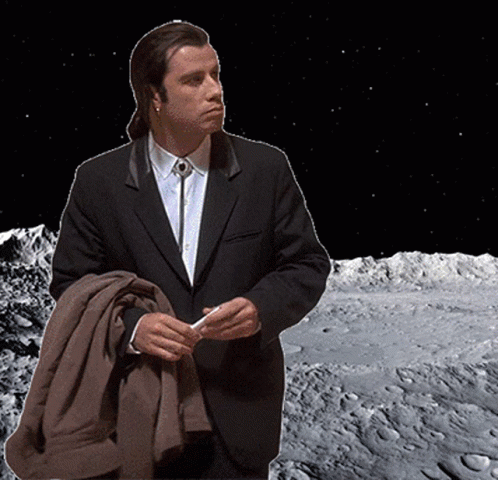 Man in Suit and Tie Before Moon