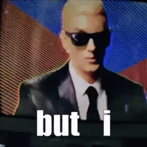 Man In Suit And Tie Before TV Saying But I GIF