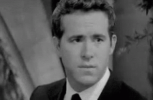 Man In Suit And Tie Black And White GIF