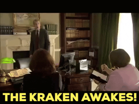 Man in Suit and Tie Bookshelf the Kraken Awakes