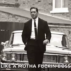 Man In Suit And Tie By Car With Caption Like A Motha Fuckin Boss GIF