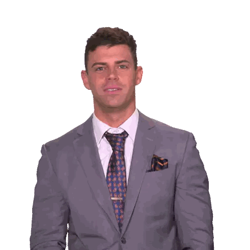 Man in Suit and Tie Clapping