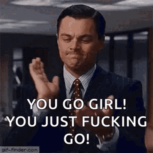 Man in Suit and Tie Clapping