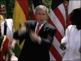 Man in Suit and Tie Dancing