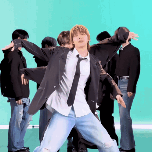 Man in Suit and Tie Dancing