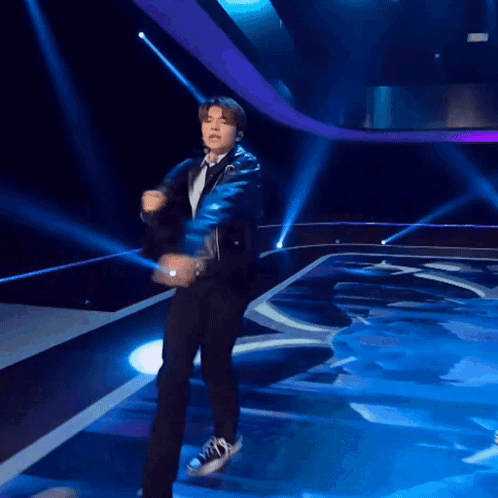 Man in Suit and Tie Dancing