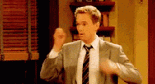 Man in Suit and Tie Dancing